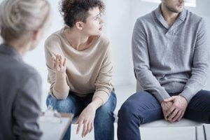 A therapist counsels a couple at an ecstasy rehab center
